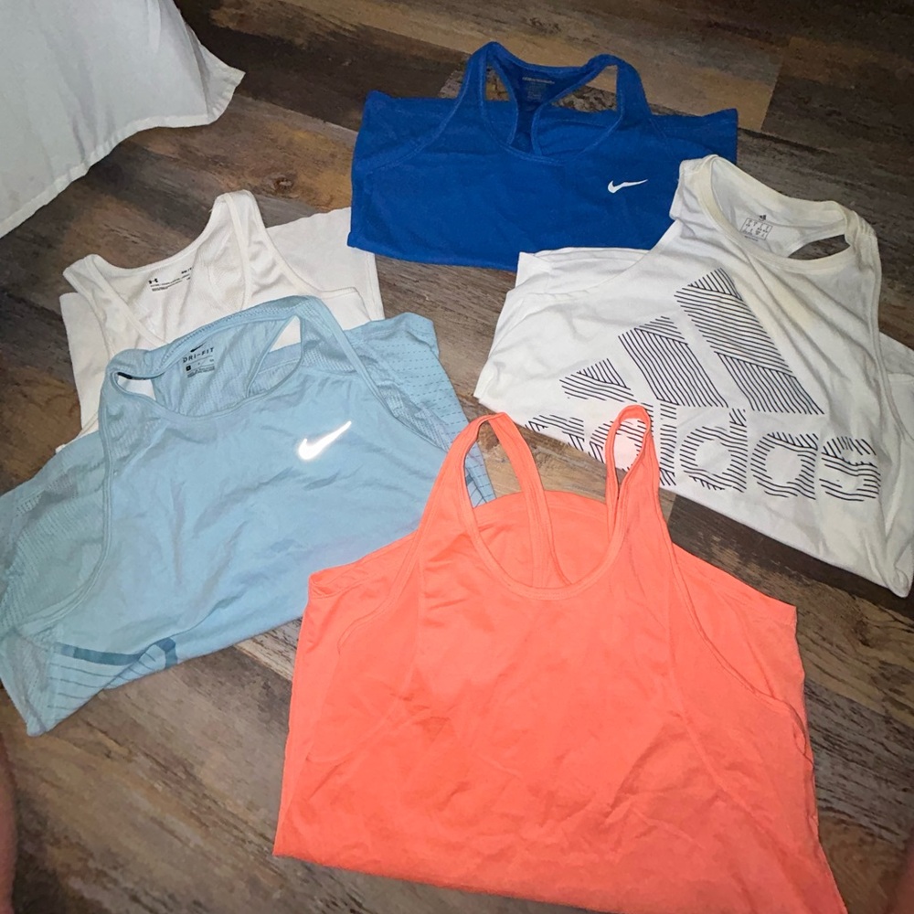 Lot of Nike, under armor, and adidas tank tops